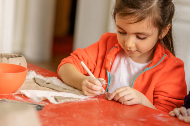 Cute Little Girls making Cremic
