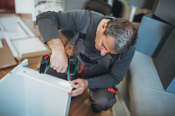 istock Senior handyman assembling furniture 1149342612