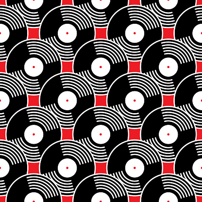 Vector seamless pattern of black vinyl records on a red background.