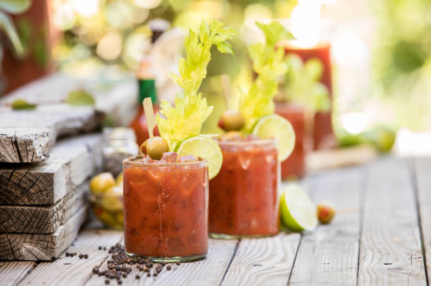 Bloody Mary's Group of bloody mary's on an outside table ready for a party tequila drink stock pictures, royalty-free photos & images
