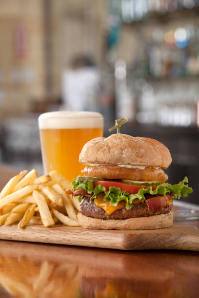 burger, fries and a beer - salad food and drink food lettuce imagens e fotografias de stock