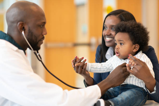 istock Baby with mother at routine medical appointment 1149368865