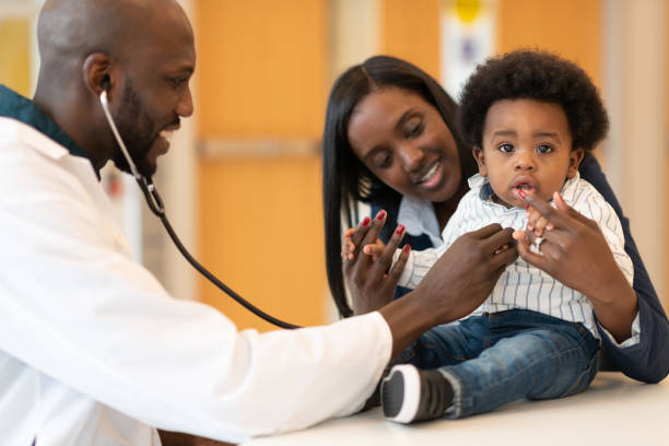 istock Baby with mother at routine medical appointment 1149368867