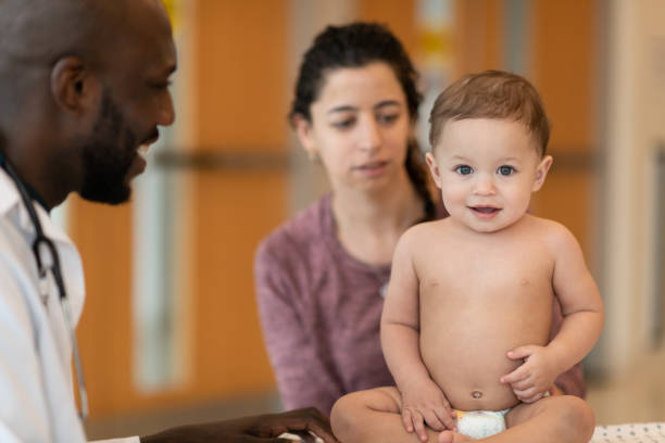 istock Baby with mother at routine medical appointment 1149368877