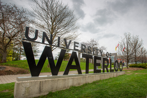 Kitchener-Waterloo, Ontario, Canada - May 11, 2019:  The University of Waterloo is one of the leading science, engineering and advanced technology studies institutions in Canada.  This photo depicts one of the main entrances to the campus from a public road.