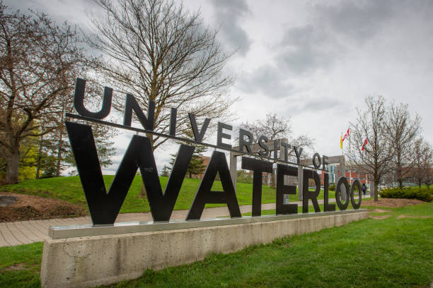University of Waterloo Kitchener-Waterloo, Ontario, Canada - May 11, 2019:  The University of Waterloo is one of the leading science, engineering and advanced technology studies institutions in Canada.  This photo depicts one of the main entrances to the campus from a public road. kitchener ontario photos stock pictures, royalty-free photos & images