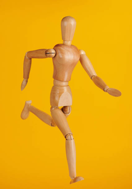 istock Running wooden doll 1149375896