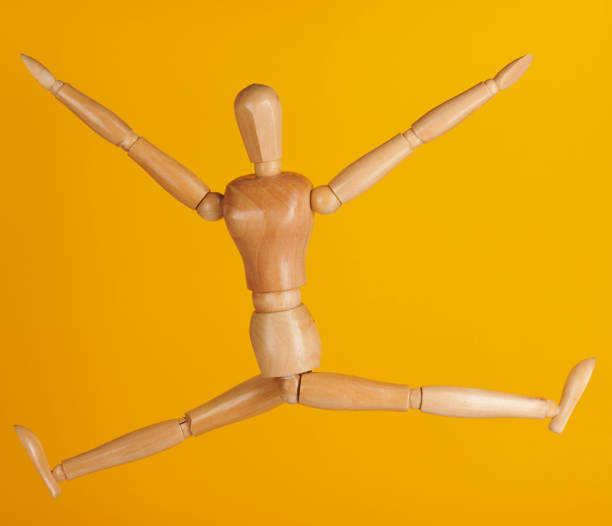 istock Happy toy in air jump pose 1149375897