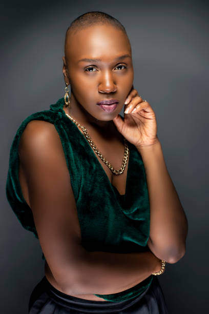 istock Beautiful Black Female Model with Bald Hairstyle 1149376002