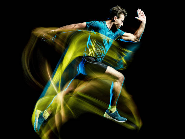 istock runner running jogger jogging man isolated light painting black background 1149377499