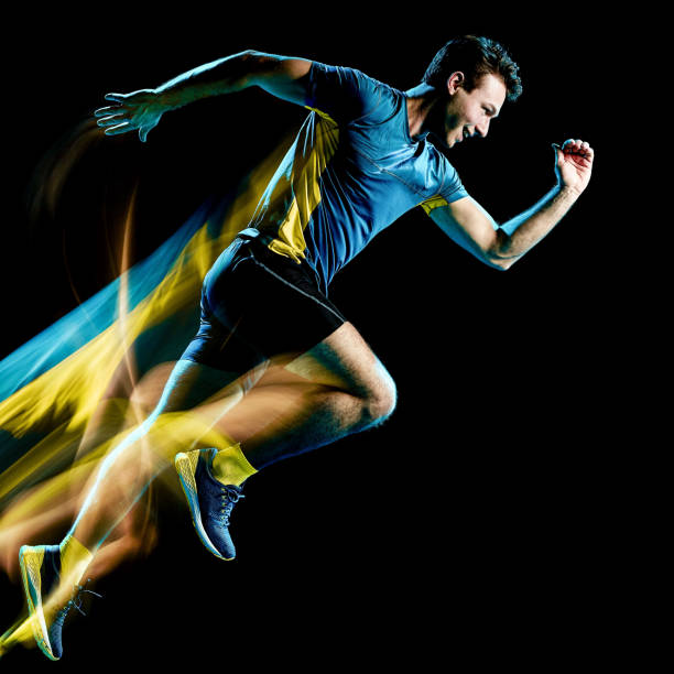 istock runner running jogger jogging man isolated light painting black background 1149377502