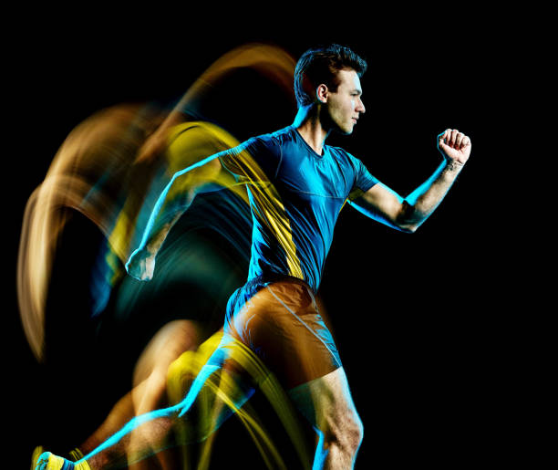 istock runner running jogger jogging man isolated light painting black background 1149377506