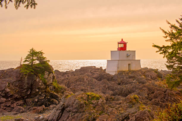istock Amphitrite Point Lighthouse at sunset, located in Ucluelet, Vancouver Island 1149378291