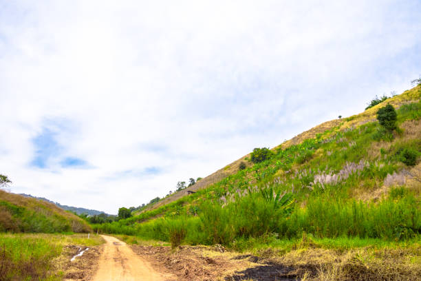 istock Driving a car on mountain curve road. 1149380559