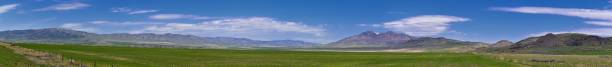 istock Tremonton and Logan Valley landscape views from Highway 30 pass, including Fielding, Beaverdam, Riverside and Collinston towns, by Utah State University, in Cache County along the Wasatch Front Range of the Rocky Mountains in Utah, USA. 1149380607