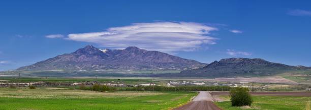 Tremonton and Logan Valley landscape views from Highway 30 pass, including Fielding, Beaverdam, Riverside and Collinston towns, by Utah State University, in Cache County along the Wasatch Front Range of the Rocky Mountains in Utah, USA.