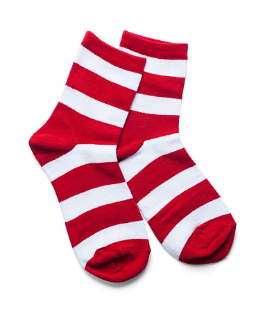 Two Red and White Striped Socks Isolated on White.