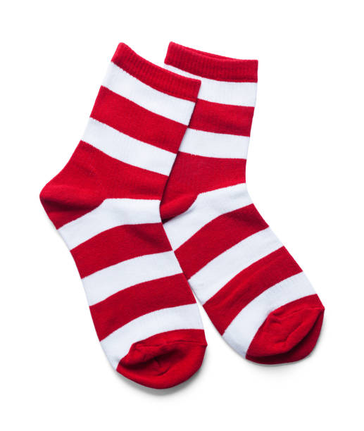Red White Striped Socks Two Red and White Striped Socks Isolated on White. pair stock pictures, royalty-free photos & images