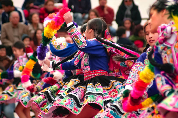 Native Peruvian group of young girls dancing the \