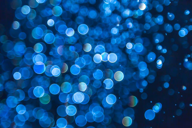 istock Blue glitter bokeh lights bokeh defocused 1149392164