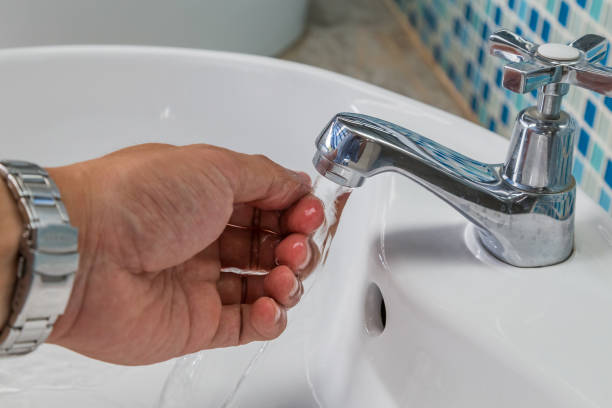 istock People washing hands under flowing tap water 1149392211
