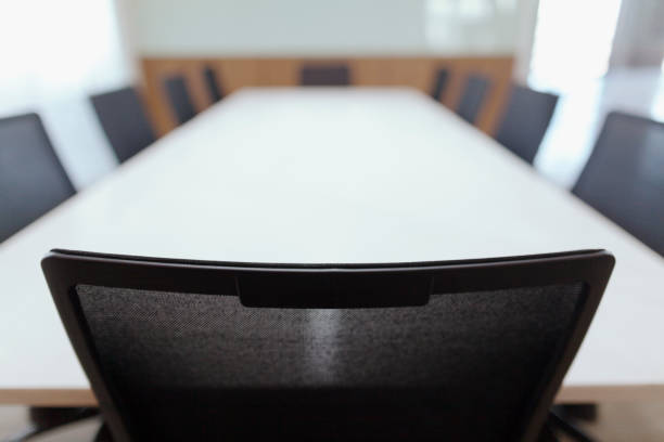 istock Conference room lead chair and meeting table 1149393448