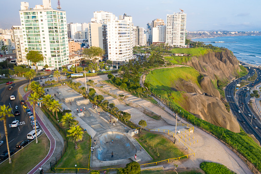 Lima, Perú - April 5 2019: Aerial view of skatepark in Lima Peru. Cliff and pacific ocean in the background. Malecon Cisneros area in Miraflores district.