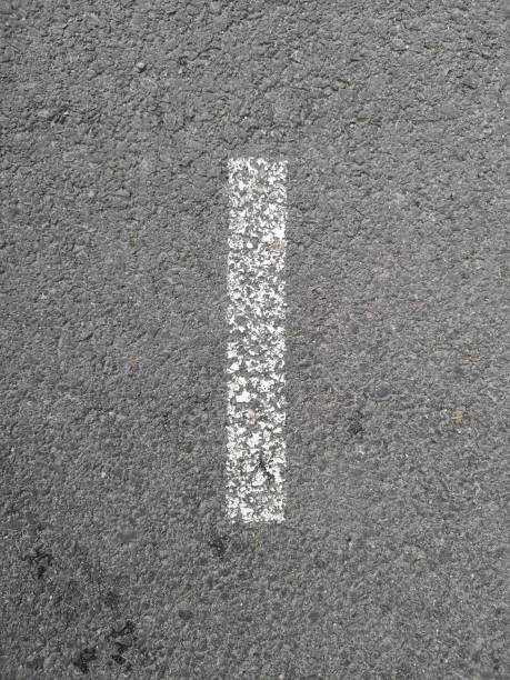 istock Letter I stenciled in white on asphalt 1149399733