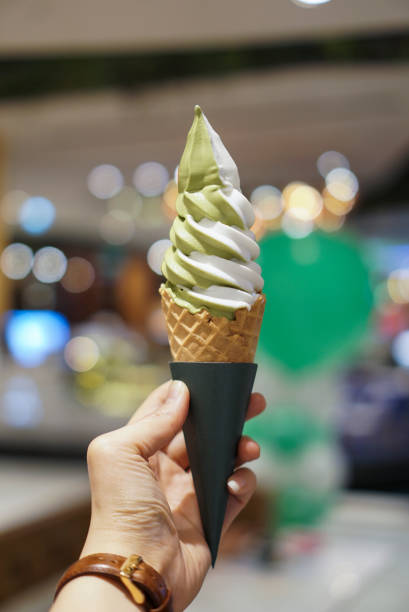 matcha and vanilla soft serve ice cream. - two tone imagens e fotografias de stock