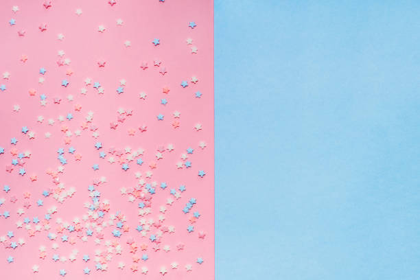 istock Little stars confetti on pink background 1149406077