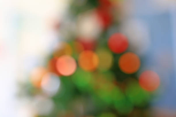 istock Blurred colorful bokeh lights on Christmas tree background. 1149406151
