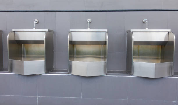 istock men's bathroom, public toilets 1149408272