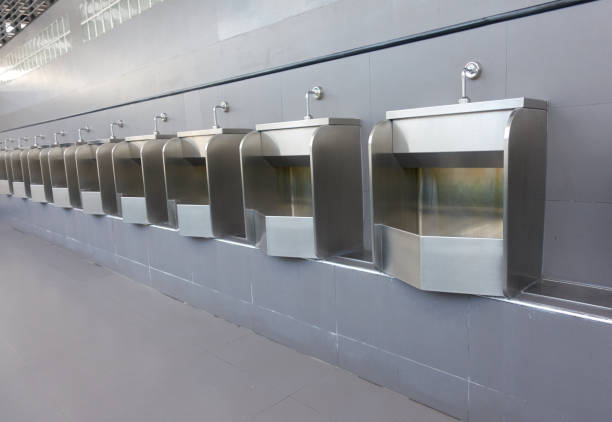 istock men's bathroom, public toilets 1149408678