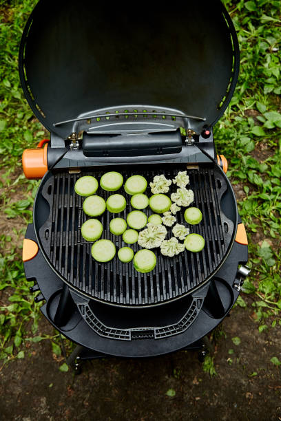 istock Grilled zucchini vegetable on huge gas grill . 1149410187