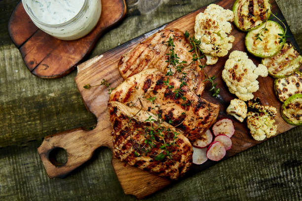 istock Steak turkey grill on wooden cutting board 1149410208