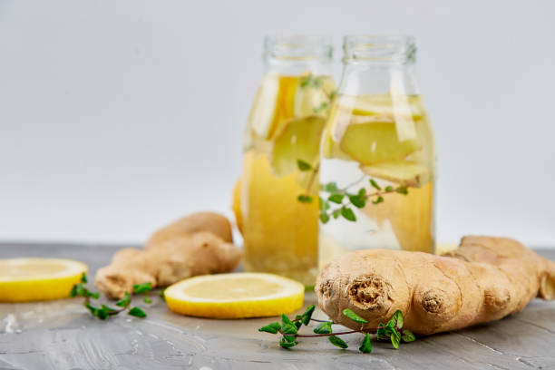 istock Detox water in bottles with ingredients, ginger, lemon, mint 1149410278