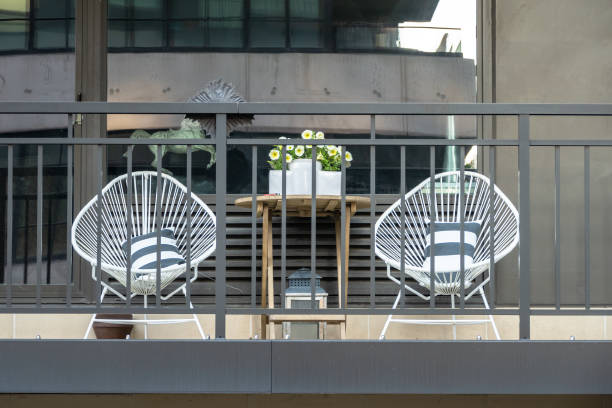 istock two chairs at a balcony in New York City 1149412021