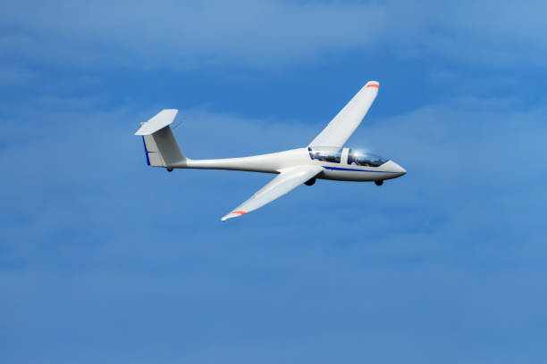 istock glider up in the blue sky 1149412316