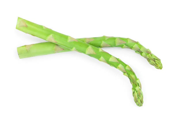 istock Fresh sprouts of asparagus isolated on white background. Top view. Flat lay 1149415877