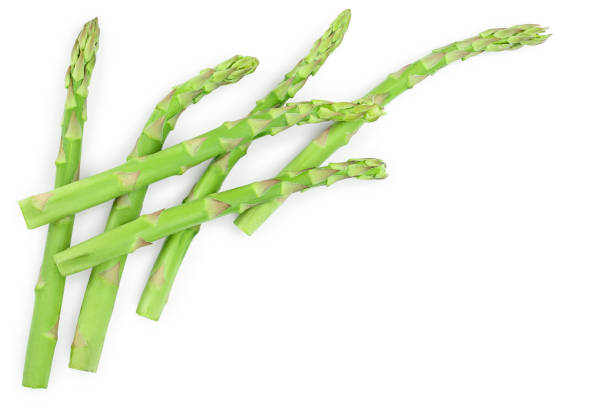 istock Fresh sprouts of asparagus isolated on white background with copy space for your text. Top view. Flat lay 1149415880