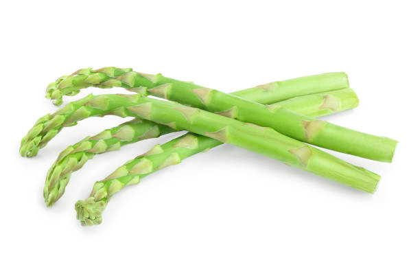 istock Fresh sprouts of asparagus isolated on white background 1149415883