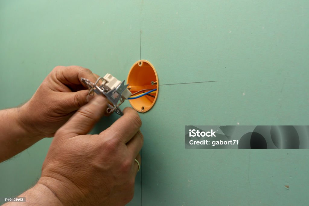 Simple Electrical Socket Installing Electrical Socket Stock Photo - Download Image Now - Cable ...