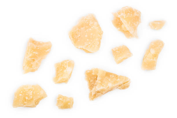 istock Parmesan cheese pieces isolated on white background. Closeup. Top view. Flat lay 1149423565