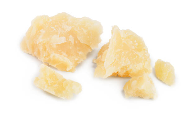 istock Parmesan cheese pieces isolated on white background. Closeup 1149423569