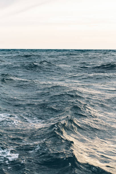 istock ripples on blue sea water , natural sea background 1149425319