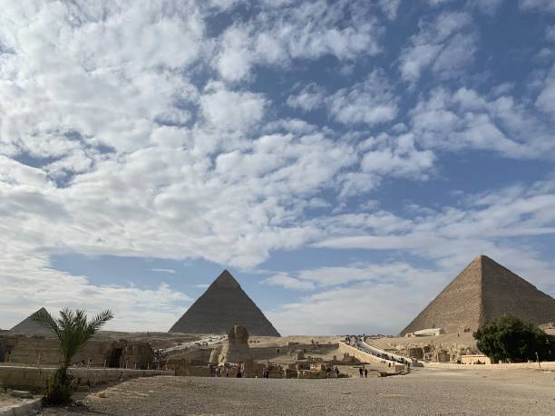 istock Human face lion statue and pyramid, Cairo 1149425467