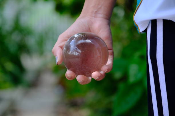 istock Crystal ball clear in hand 1149426245