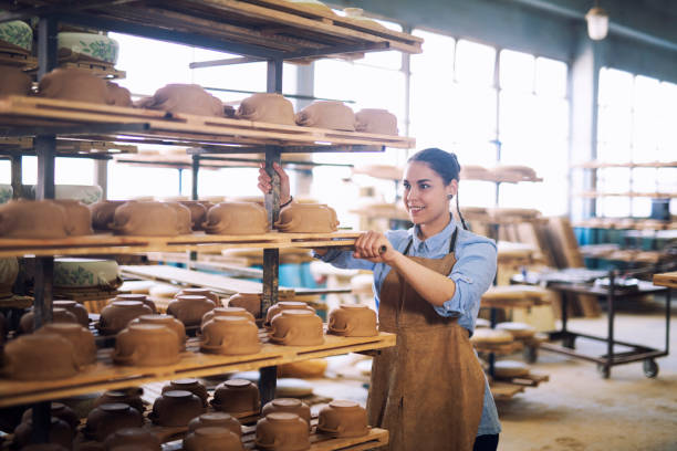 istock Woman working in pottery studio. 1149426259