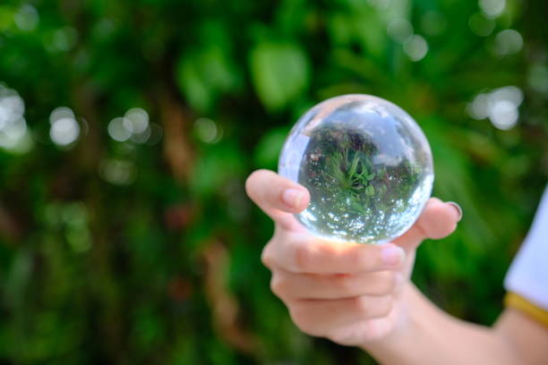istock Crystal ball clear in hand 1149426378