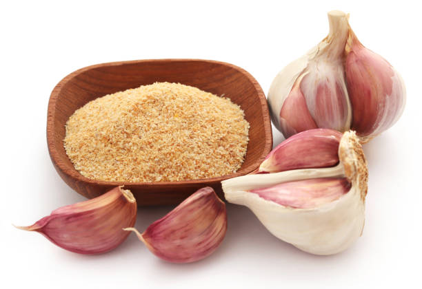 istock Garlic powder whith whole bulb 1149426524